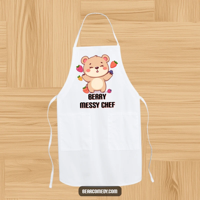 Funny Apron showing a bear character with a goofy grin, comically juggling berries, perfect for adding humor to cooking tasks.