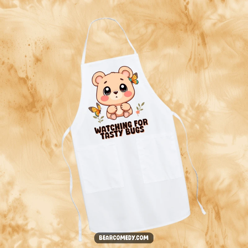 Funny bear character with wide, wondering eyes watching a butterfly on a kitchen apron, adding whimsical charm.