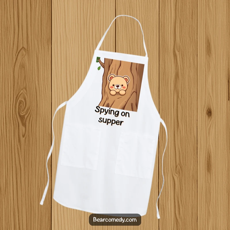 Funny apron showing a bear character curiously peeking from behind a tree, adding humor to kitchen tasks and protecting clothing.