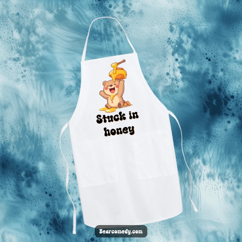 Funny apron featuring a delighted bear character reaching for a giant, dripping honey pot, ready to cook up some laughs.