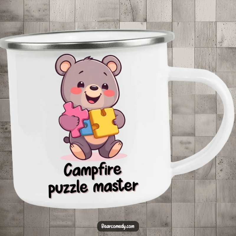 Funny bear camping mug with a smiling character balancing colorful puzzle pieces, perfect for enjoying beverages during any endeavor.