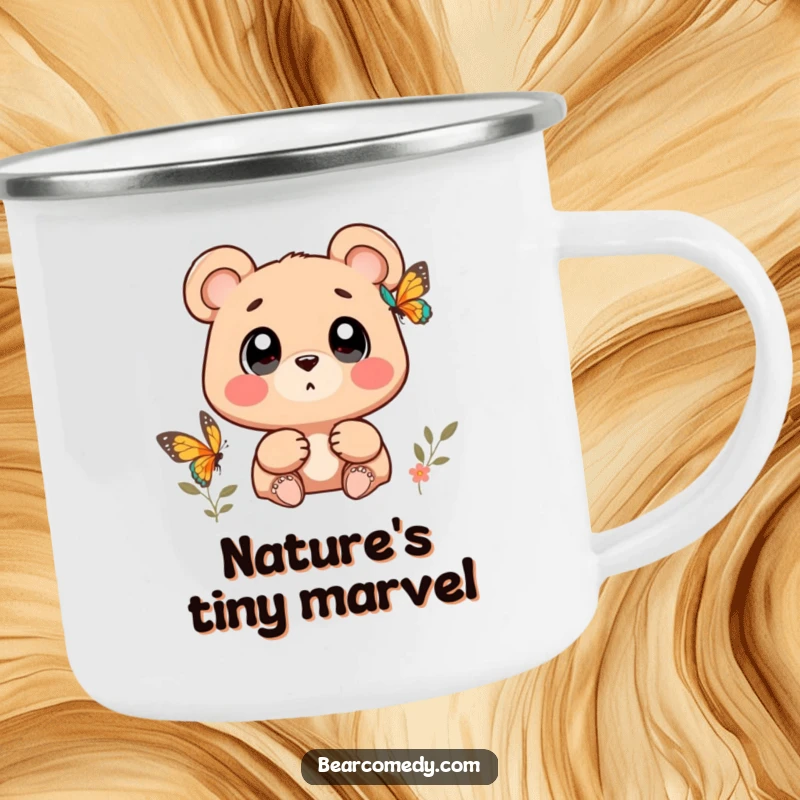 Funny bear character with wide, wondering eyes watching a butterfly on a durable camping mug, for outdoor wonder.