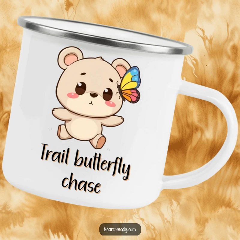 Funny camping mug featuring a bear character with wide eyes chasing a butterfly, durable for outdoor adventures with whimsical appeal.