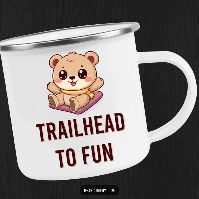Funny bear camping mug with a cartoony bear sliding down a snowy hill, ideal for enjoying drinks during outdoor adventures.
