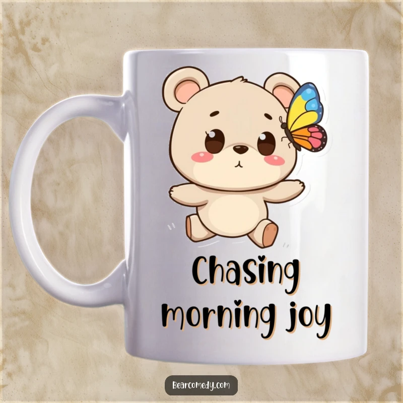 Funny mug featuring a bear character with wide, excited eyes chasing a colorful butterfly through a scenic background.