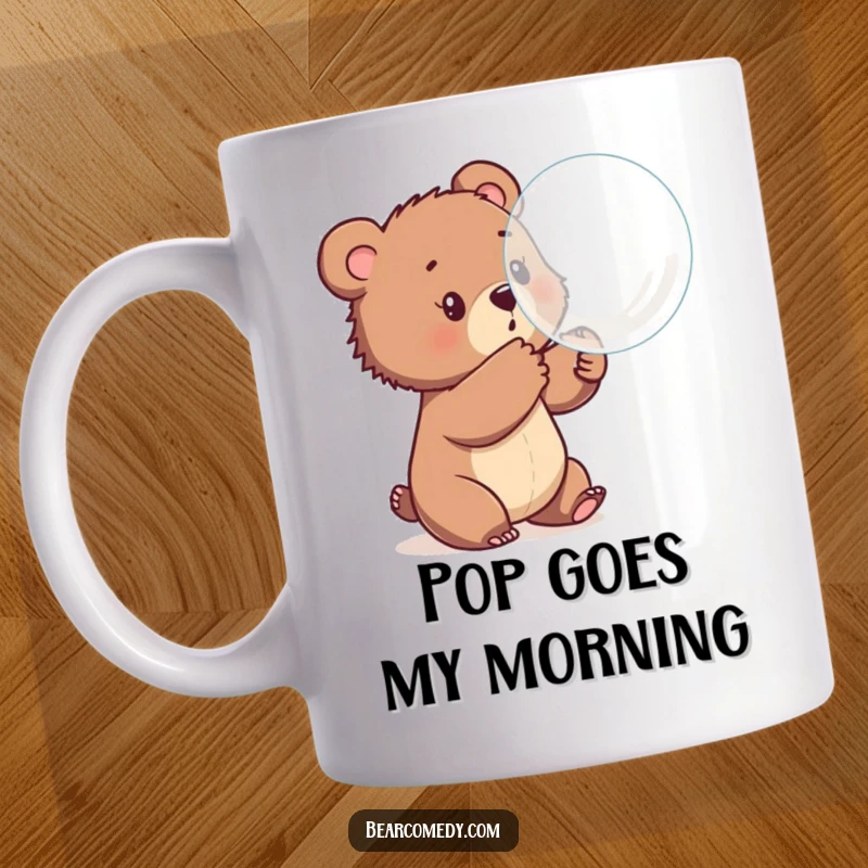 Funny mug showing a playful bear cub batting at a large, iridescent, bouncing bubble, embodying carefree fun and wonder.