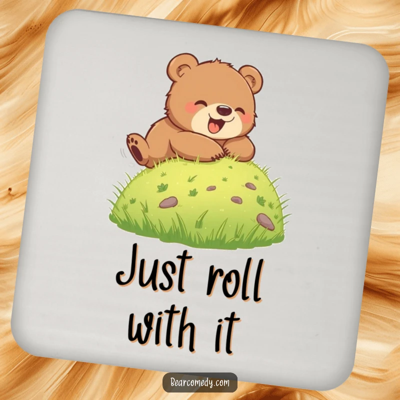 Funny drink coaster with a bear cub rolling down a grassy hill, adding a playful touch to beverage service and protecting surfaces.