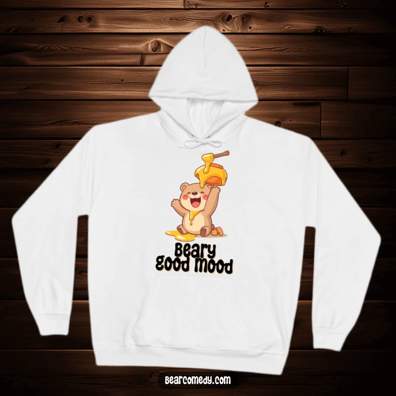Funny hoodie depicting a bear character gleefully reaching for a giant, dripping honey pot, embodying pure delight and sweetness.