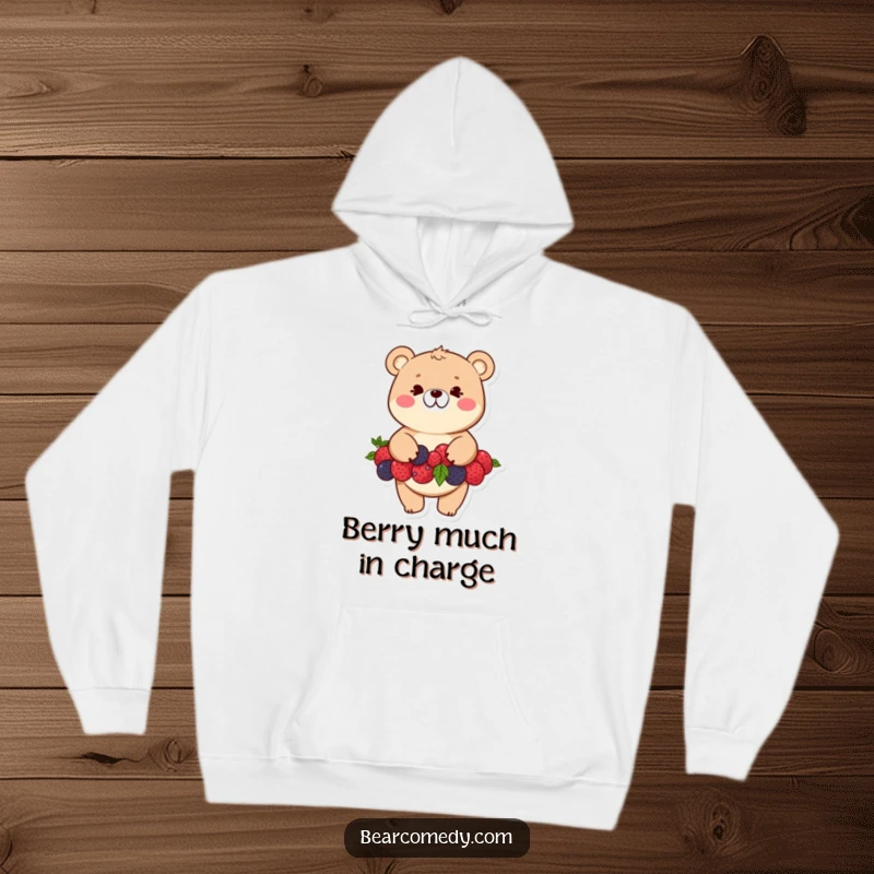Funny bear hoodie with a mischievous character balancing a precarious stack of colorful berries and a cheeky grin.