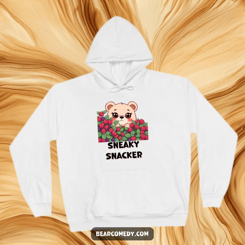 Funny hoodie with a bear character sporting large, curious eyes, peeking shyly from behind a berry bush, perfect for cozy adventures.