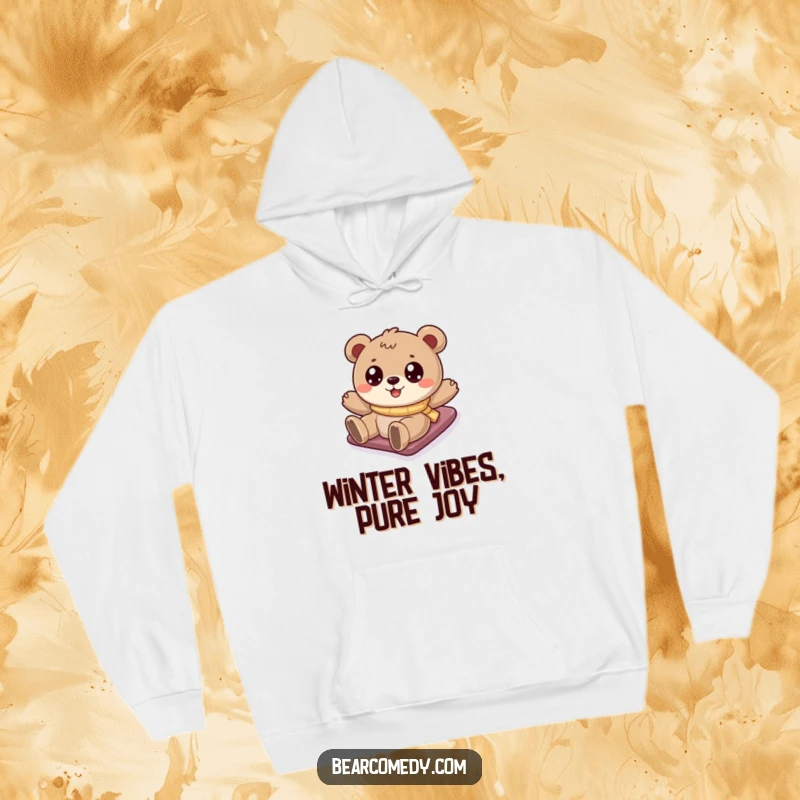 Funny bear hoodie featuring a cartoony bear with big eyes sliding down a snowy hill, perfect for cozy winter fun.