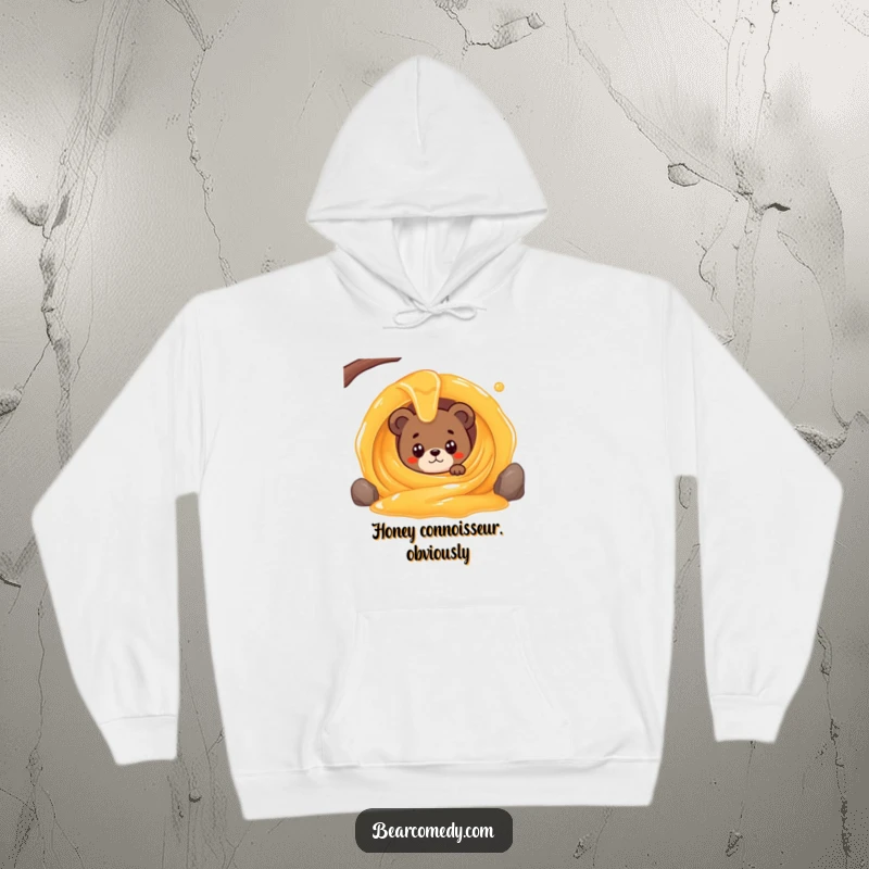 Funny hoodie with a bear character wide-eyed peeking from a giant, swirling honey stream, highlighting cozy fascination with honey.