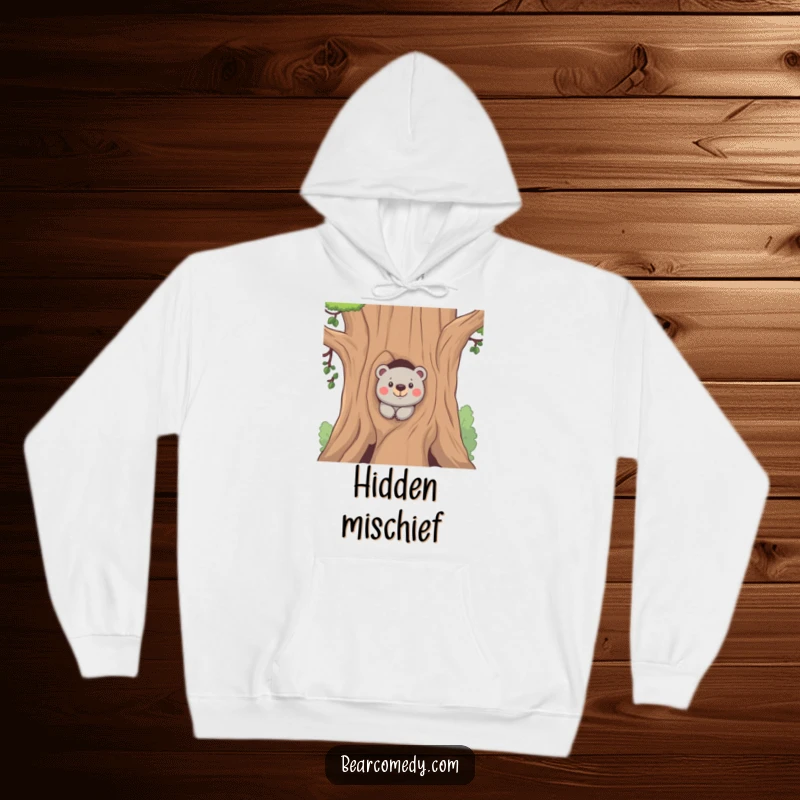 Funny hoodie featuring a bear peeking from behind a tree with a mischievous expression, ideal for comfortable and humorous casual wear.