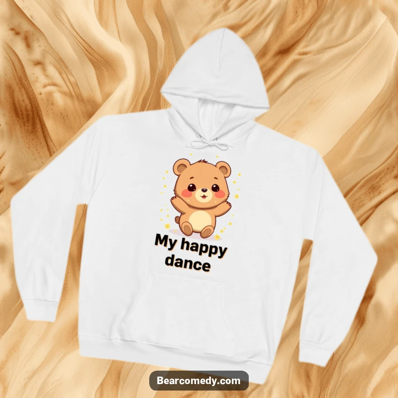 Funny hoodie with a gleeful bear character spinning happily, dusted with sparkling pollen, perfect for cozy moments.