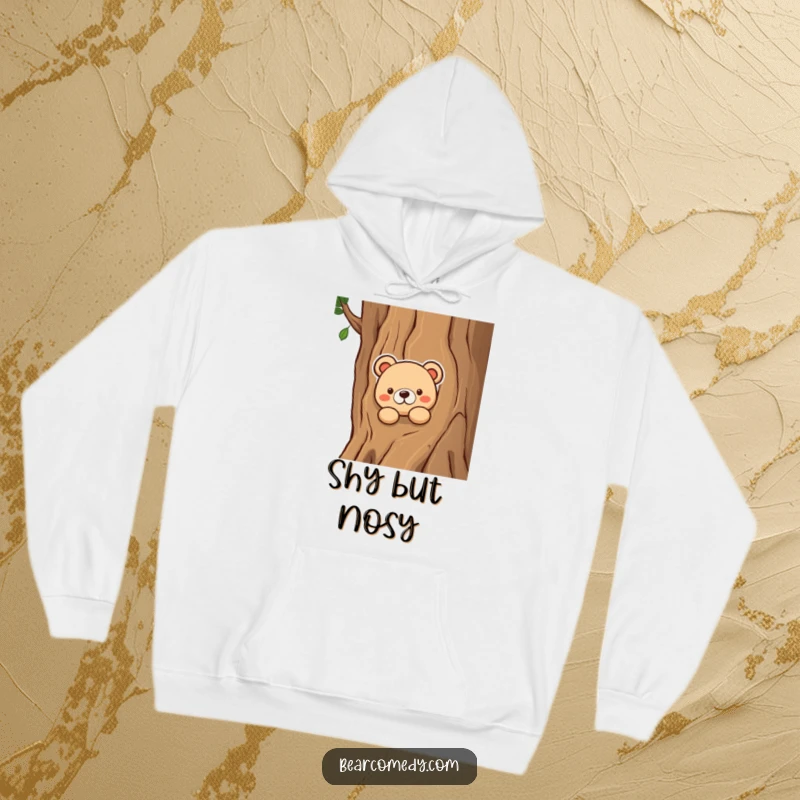 Funny hoodie featuring a curious bear peeking out from behind a massive tree trunk, perfect for cozy moments and playful observation.