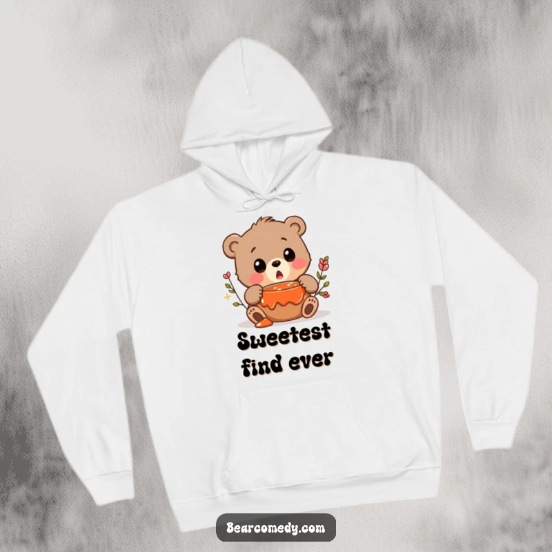 Funny hoodie depicting a bear character with a surprised squeak, finding a hidden pot of jam.