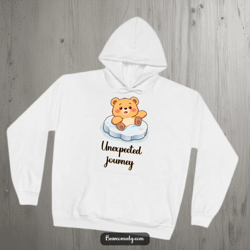 Funny hoodie with a bear character comically sliding on a slick ice patch, legs flying, with an expression of surprised delight.