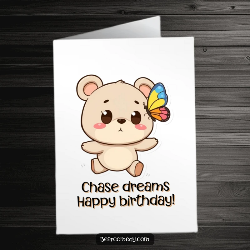 Funny free printable birthday card of a bear with wide eyes chasing a colorful butterfly with enthusiasm.