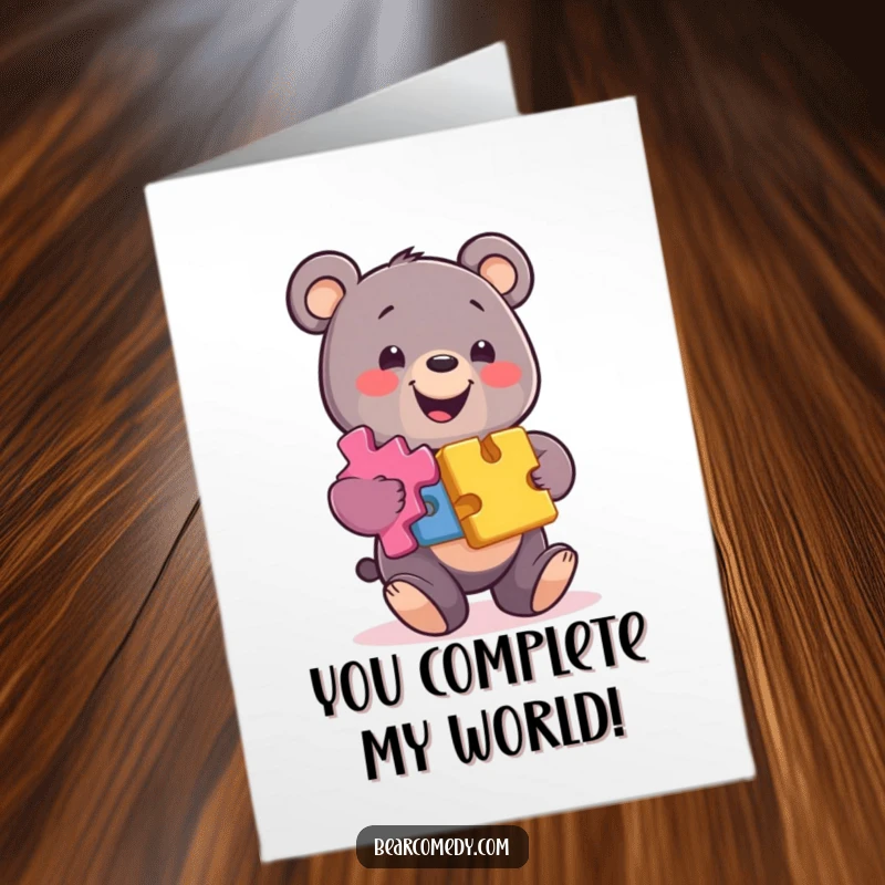 Funny Free Printable Birthday Card: A smiling bear character expertly balances a stack of colorful puzzle pieces, ready for fun.