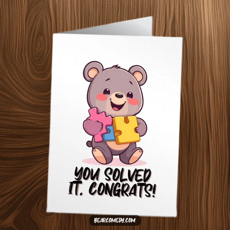 Funny Free Printable Congratulations Card: A smiling bear balances colorful puzzle pieces, symbolizing a successful completion.