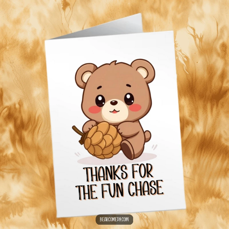 Funny Free Printable Thank You Card: Bear joyfully chasing a rolling pinecone, eyes shining with delight.