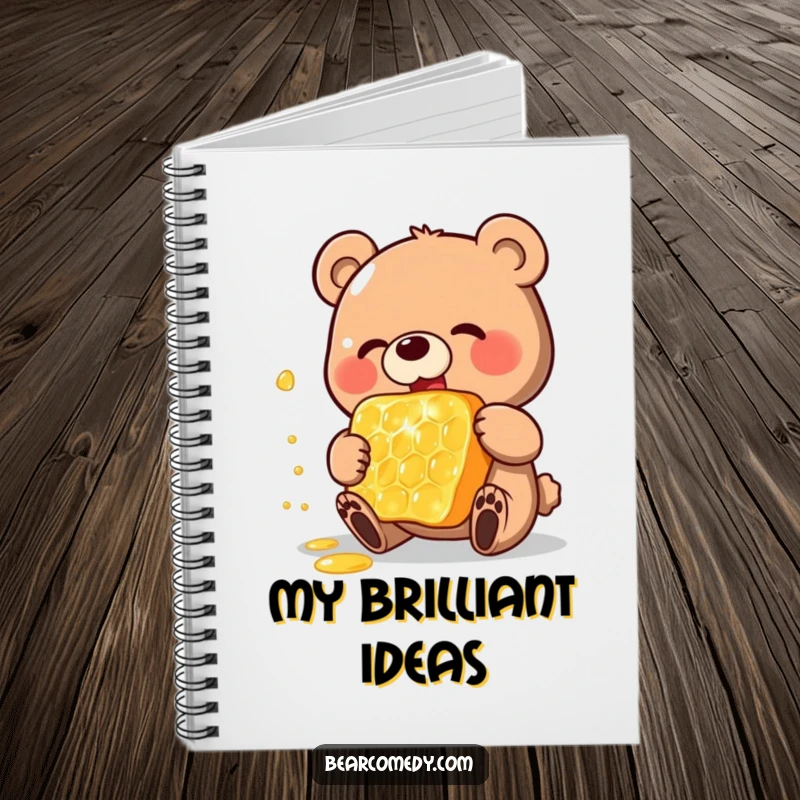 Funny notebook with a happy bear charactereating a gigantic, shimmering honeycomb on the cover, perfect for journaling or sketching.
