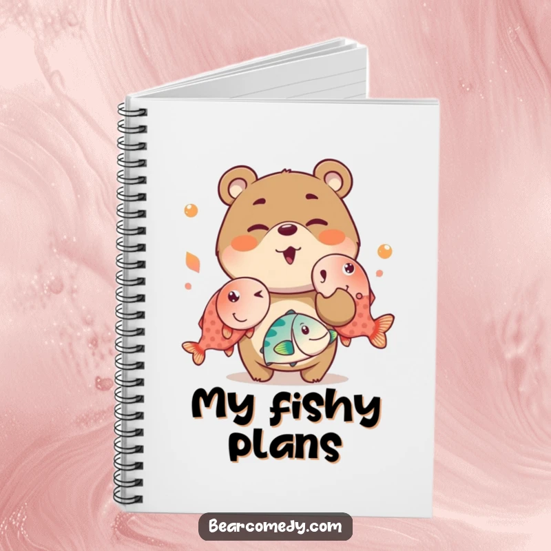 Funny notebook with a mischievous bear charactere winking and juggling oversized, bright fish on the cover, ideal for notes and doodles.