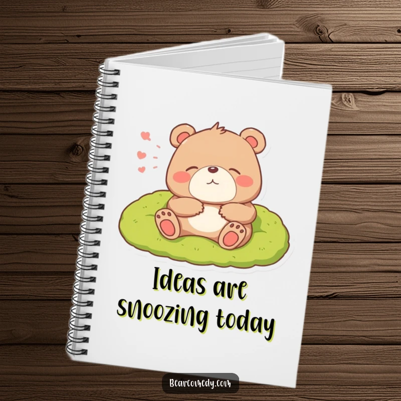 Funny notebook cover showing a bear character lounging cozily on a mossy bed and letting out a big, happy sigh.