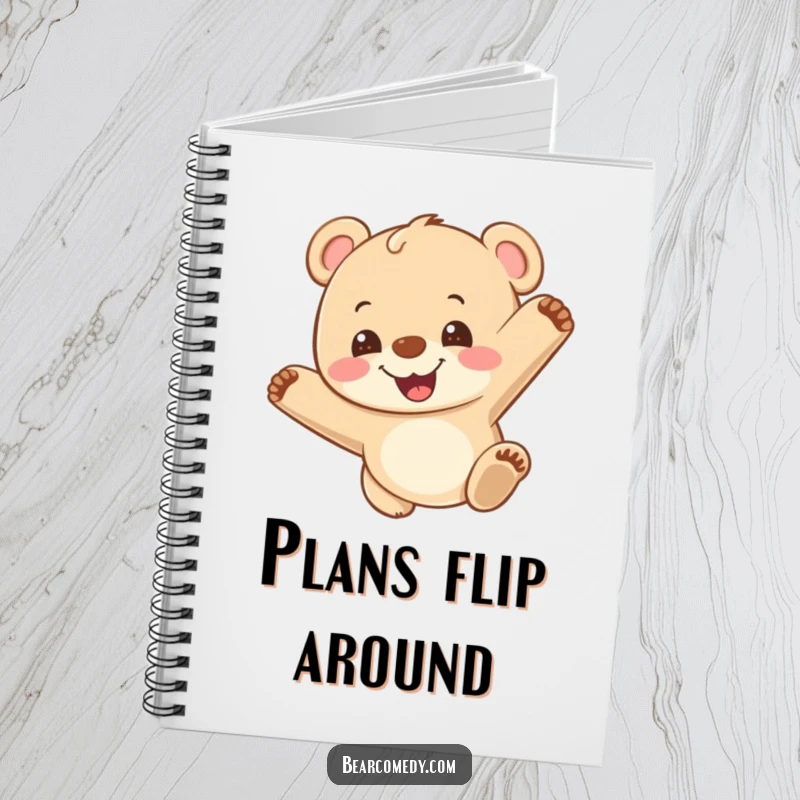 Funny notebook cover showing a bear cub doing a somersault with a grin, symbolizing energetic thoughts and playful creativity.