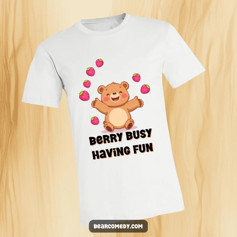 Funny bear t-shirt depicting a cheerful bear masterfully juggling a pile of vibrant, bouncing berries with a wide smile.