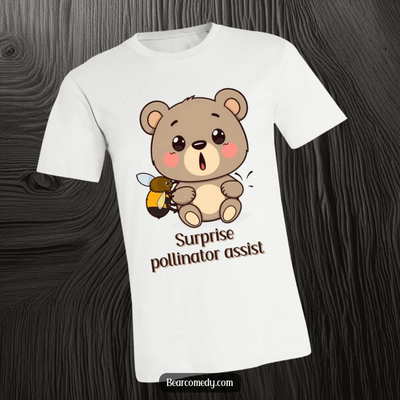 Funny t-shirt print of a cartoon bear looking shocked as a bumblebee gives it a helpful lift, whimsical and amusing.