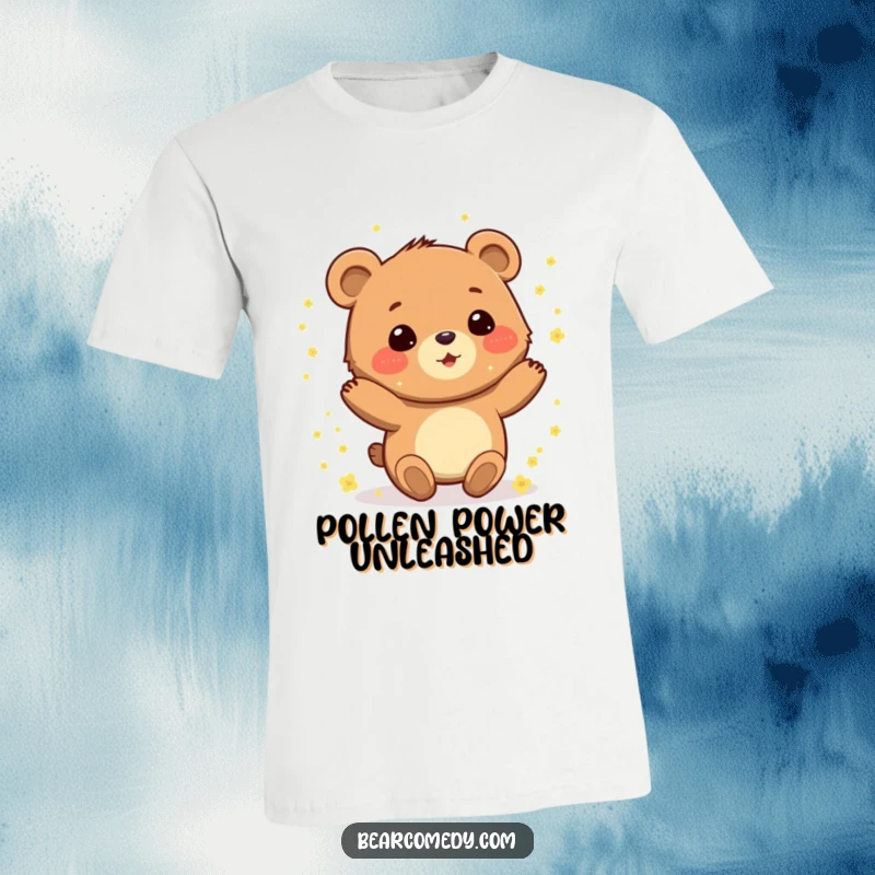 Funny t-shirt showing a gleeful bear character joyfully spinning, completely covered in shimmering golden pollen.