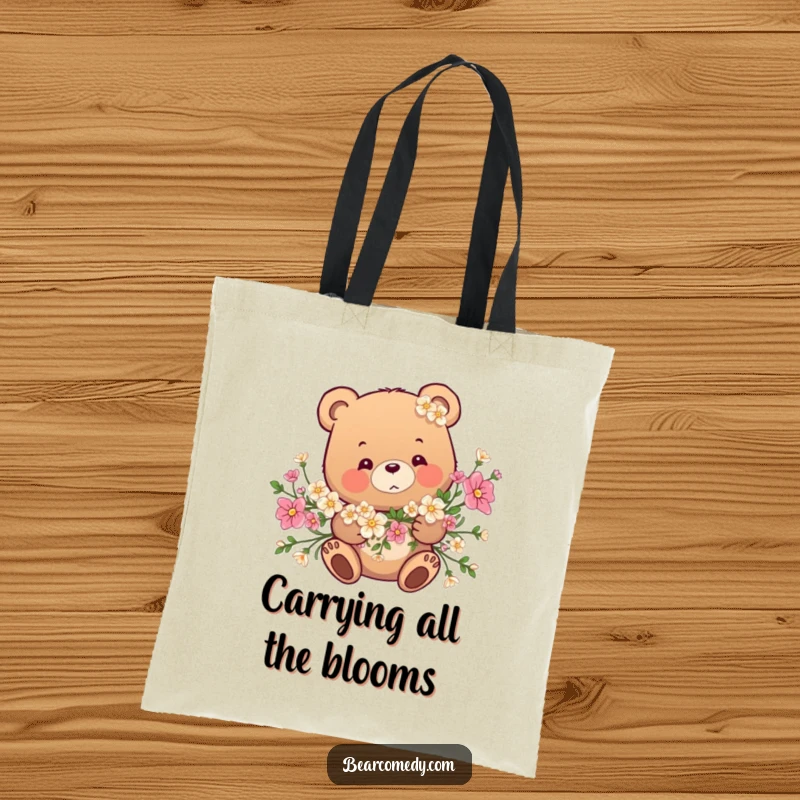 Funny tote bag design: A bear is playfully caught within a garland of colorful, fragrant flowers, looking cute and confused.
