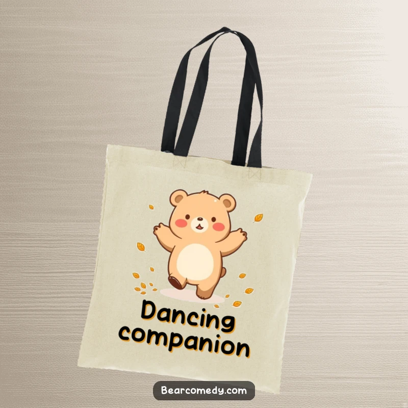 Funny tote bag depicting a bear character in a joyful lumbering dance, with small leaves playfully scattered around.
