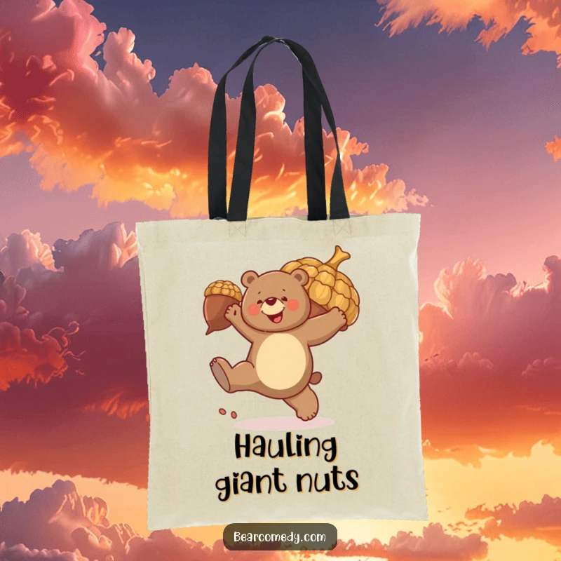 Funny tote bag graphic: A bear joyfully kicks a huge, bouncing acorn, symbolizing playful energy and outdoor fun.