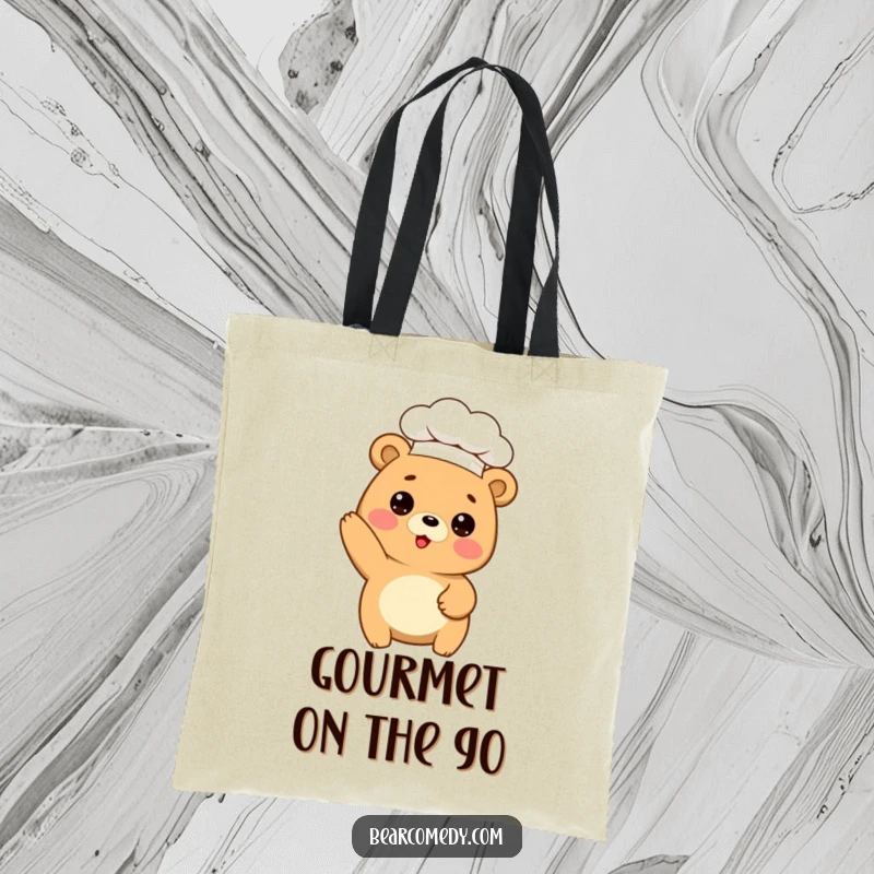 Funny tote bag featuring a cute bear in a chef hat, playfully posing mid-bake, perfect for carrying kitchen essentials.