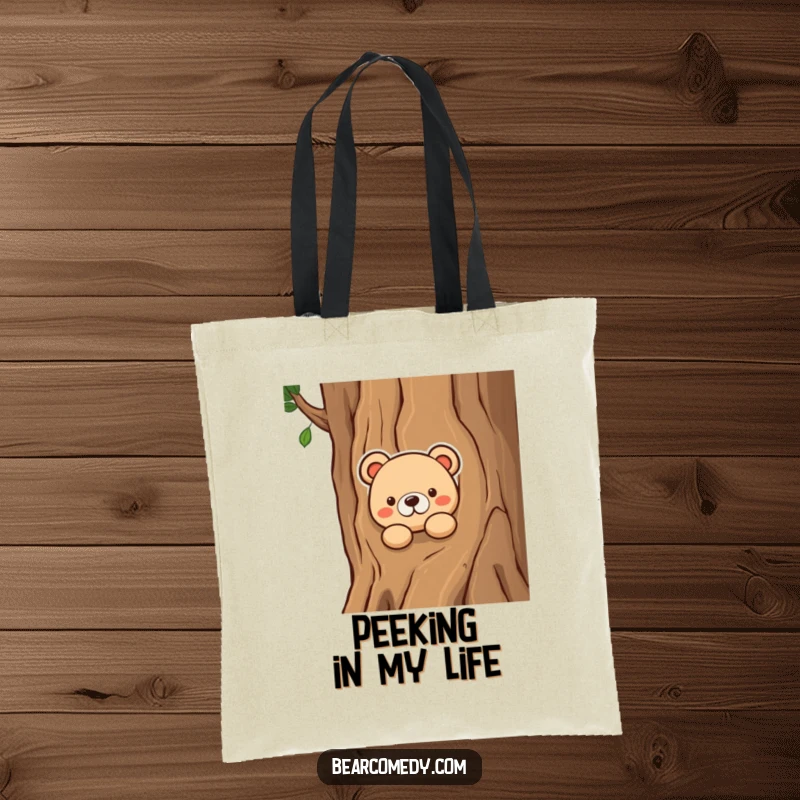 Funny tote bag showcasing a bear character peeking inquisitively from behind a tree, adding a touch of playful mystery to your carry-all.