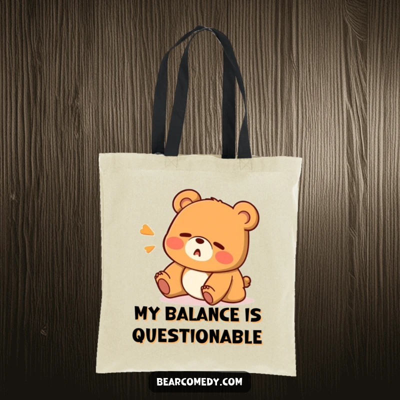 Funny tote bag depicting a surprised bear character mid-stumble with an 'Oops!' expression, showcasing humorous and practical design.